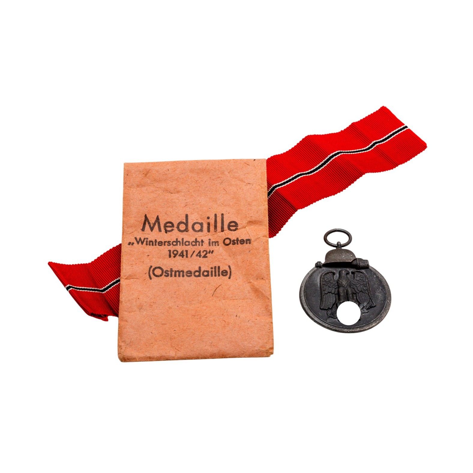 Ostmedaille „Winterschlacht im Osten 1941/42“ mit Band und Originaltüte